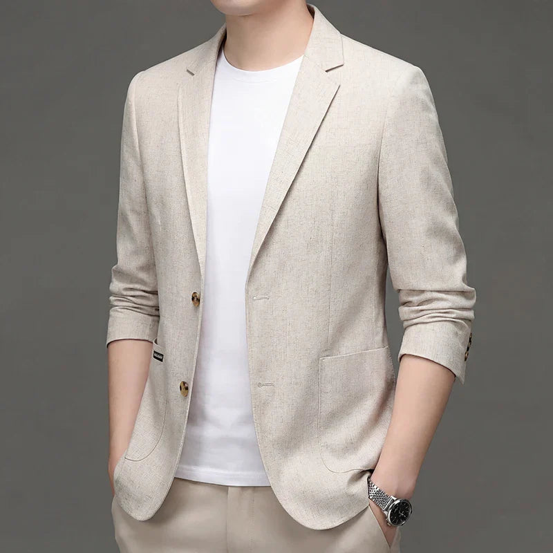 Man wearing a light-beige two-button summer blazer over a white T-shirt