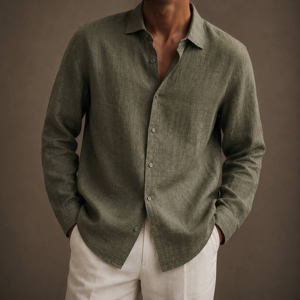 Man wearing an olive-green relaxed long-sleeve button-front shirt