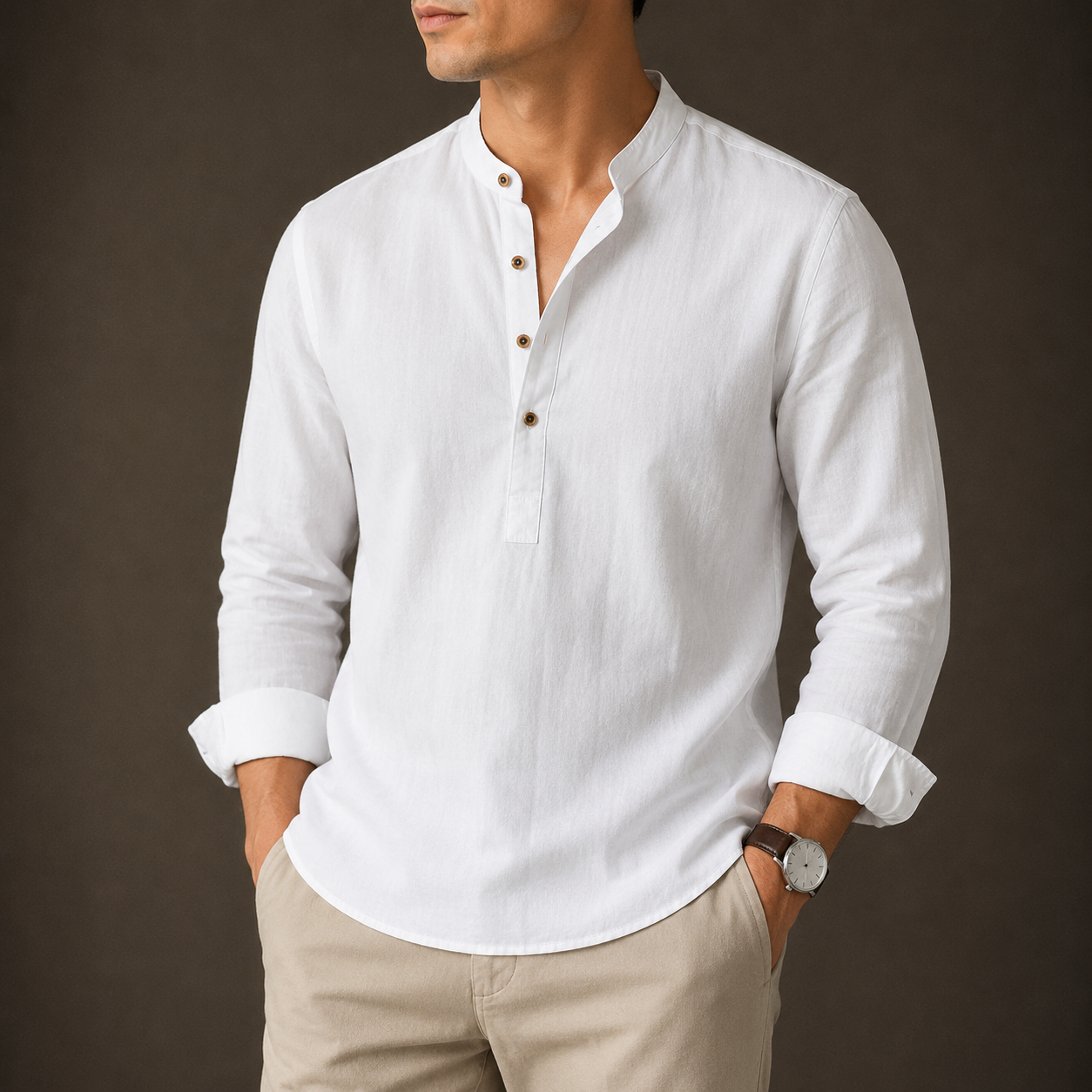 Man wearing a white Mandarin-collar linen shirt with beige trousers