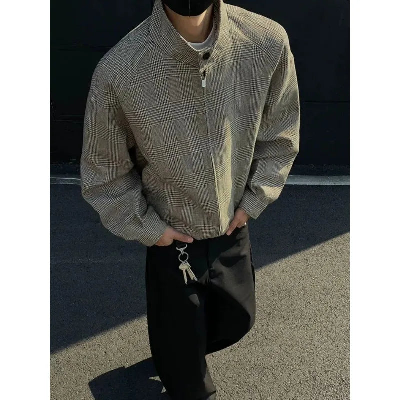 Man wearing the houndstooth Harrington jacket with black trousers