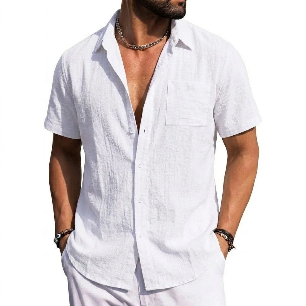 Man wearing a white short-sleeve button-front shirt