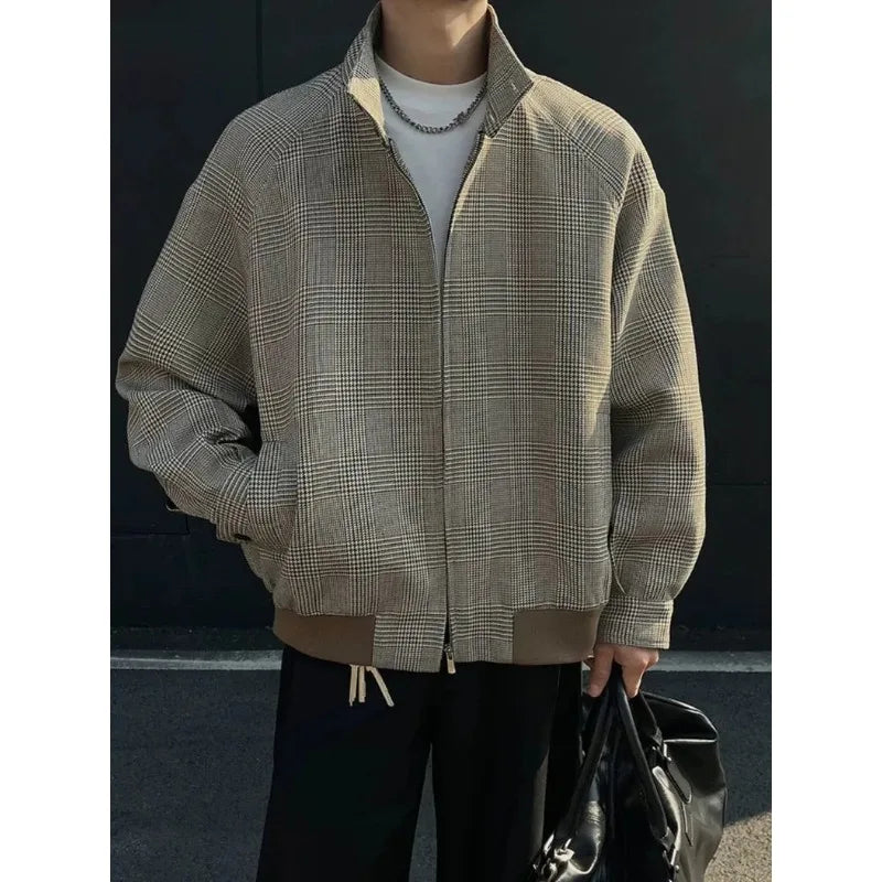Front view of the brown houndstooth Harrington jacket on a man