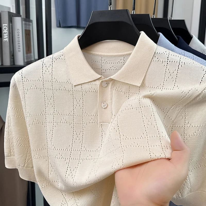 Off-white open-knit polo on a hanger showing geometric pointelle texture