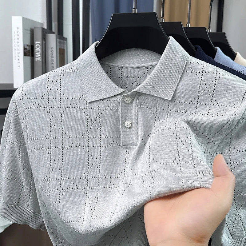Light-gray open-knit polo on a hanger