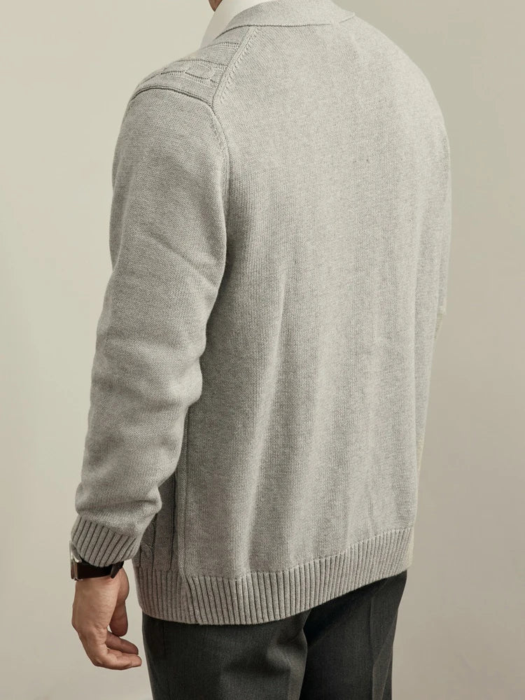Back view of a light gray knit cardigan