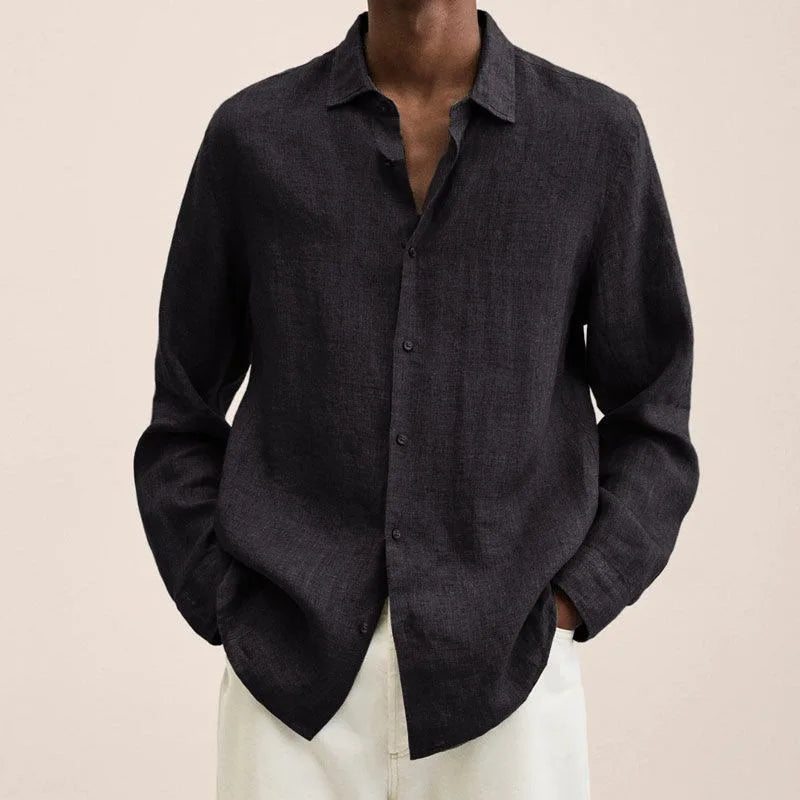 Man wearing a black relaxed long-sleeve shirt