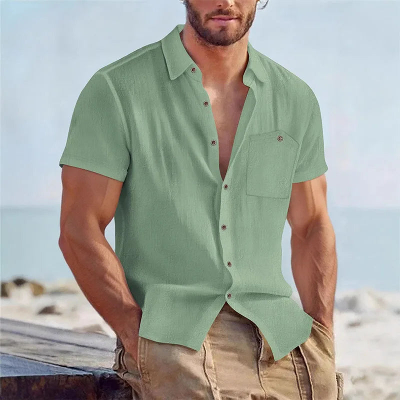 Man wearing a light green linen-blend short-sleeve shirt