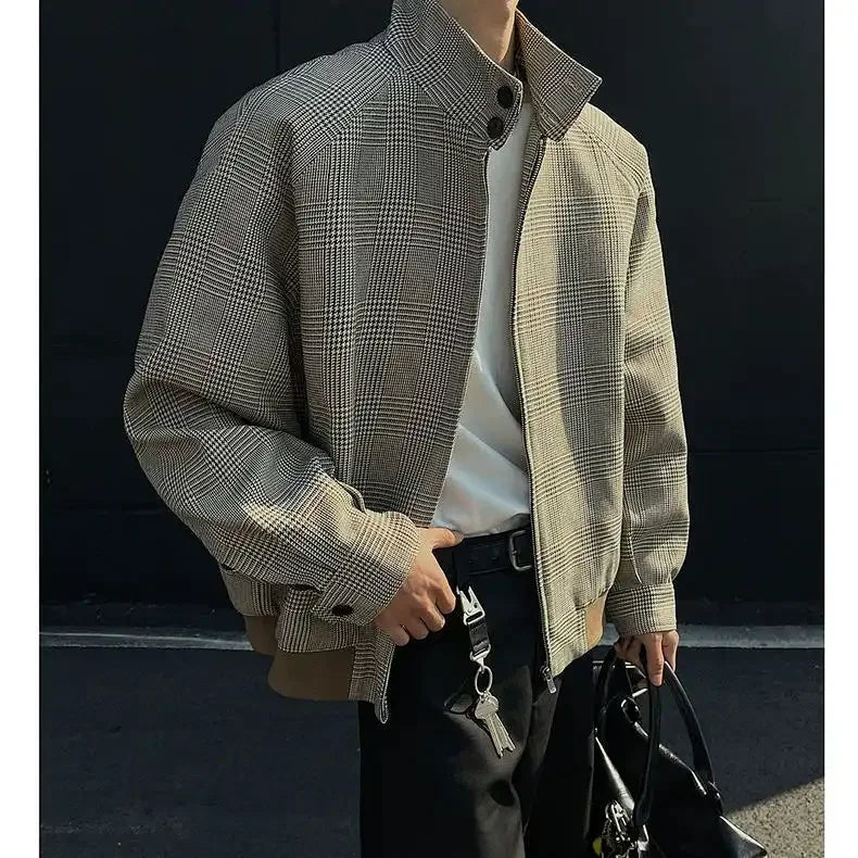 Three-quarter view of the brown houndstooth Harrington jacket