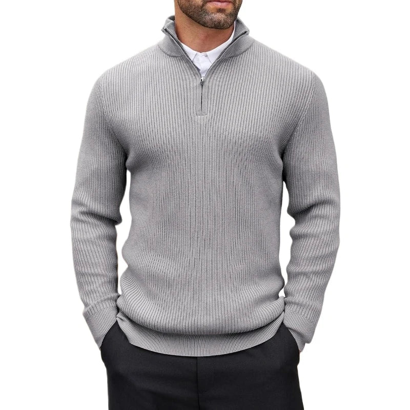 Man wearing a light-gray ribbed quarter-zip sweater