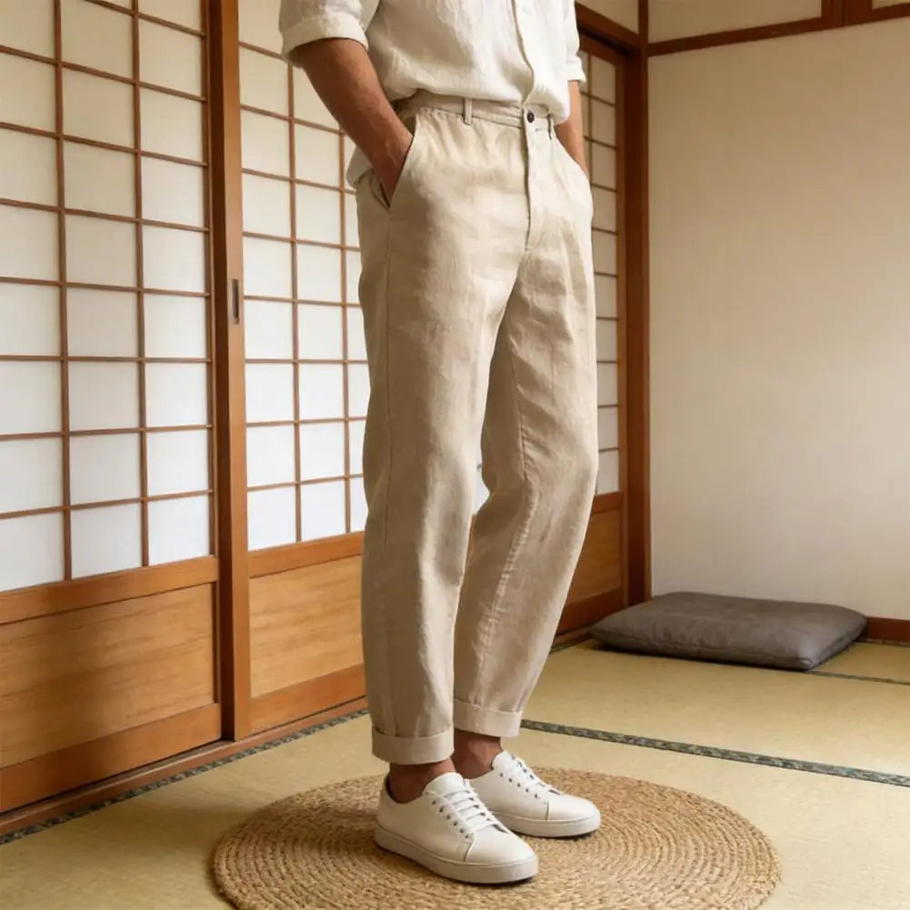 Side view of khaki relaxed cropped trousers