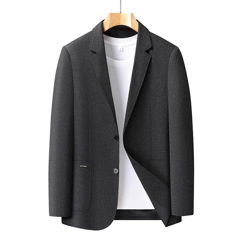 Black lightweight blazer displayed on a wooden hanger