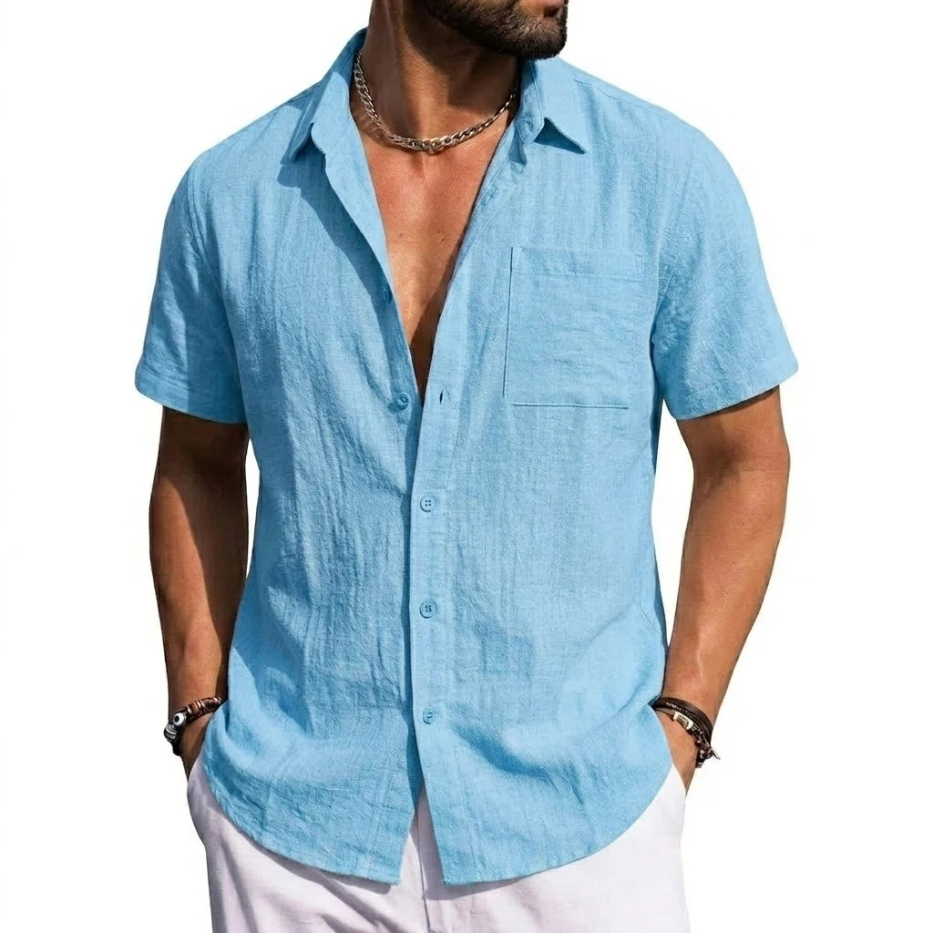 Man wearing a sky-blue short-sleeve button-front shirt