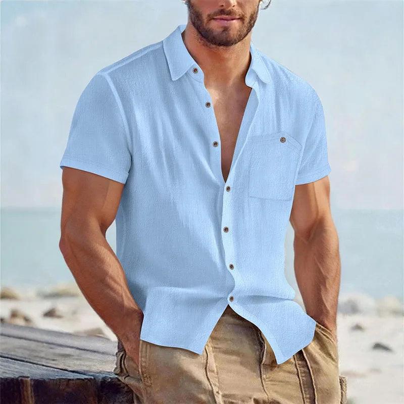 Man wearing a light-blue linen-blend short-sleeve shirt