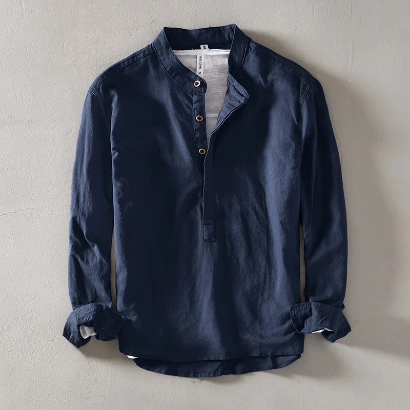 Navy Mandarin-collar linen shirt displayed against a neutral wall
