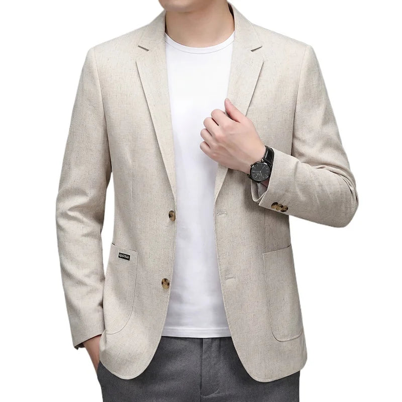 Man wearing an apricot two-button blazer over a white T-shirt