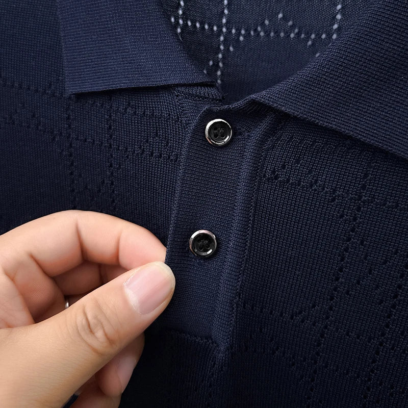 Close-up of the navy polo collar and two-button placket