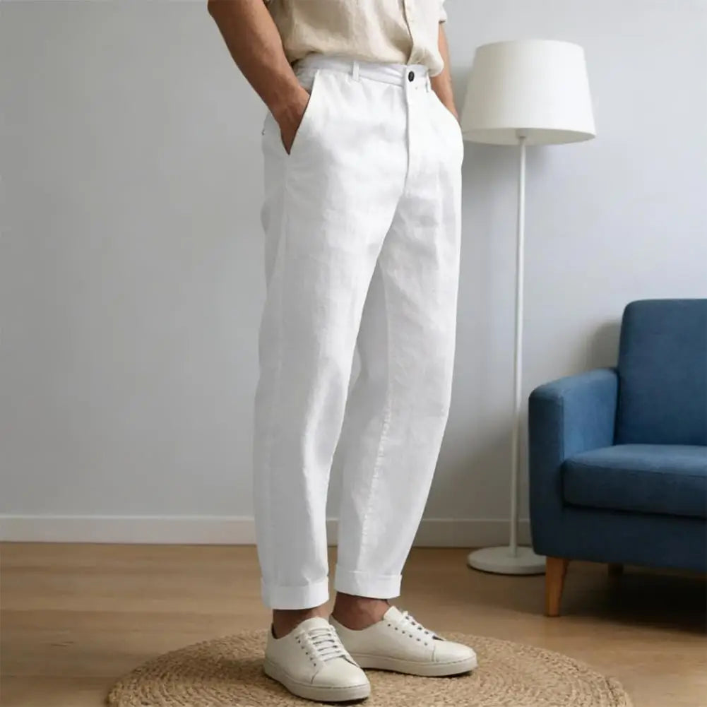 Man wearing white relaxed cropped trousers