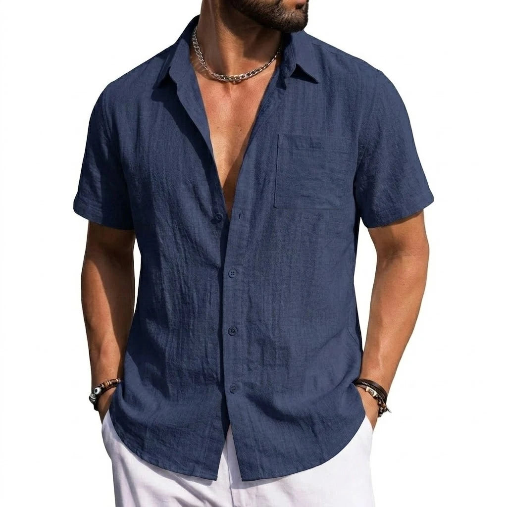 Man wearing a navy short-sleeve button-front shirt