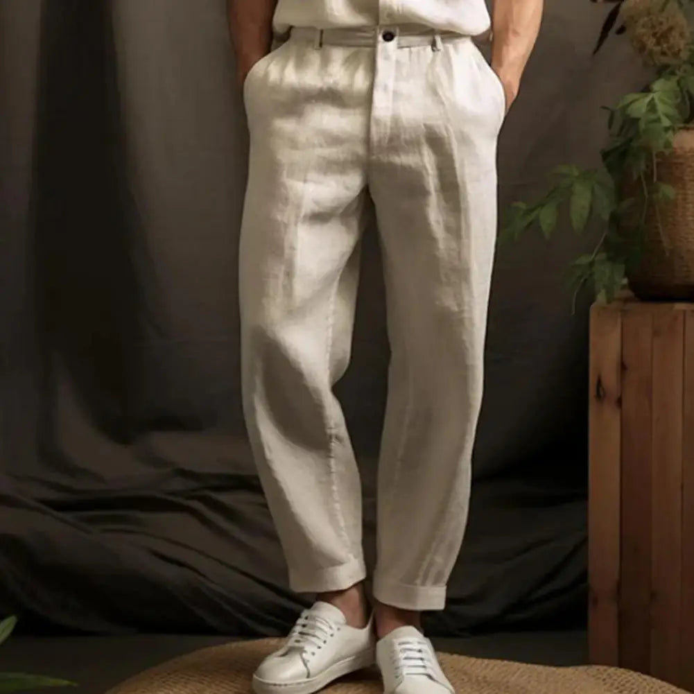 Man wearing khaki cropped trousers with an elastic waist