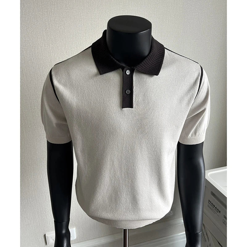 Beige contrast-collar knit polo displayed on a black mannequin